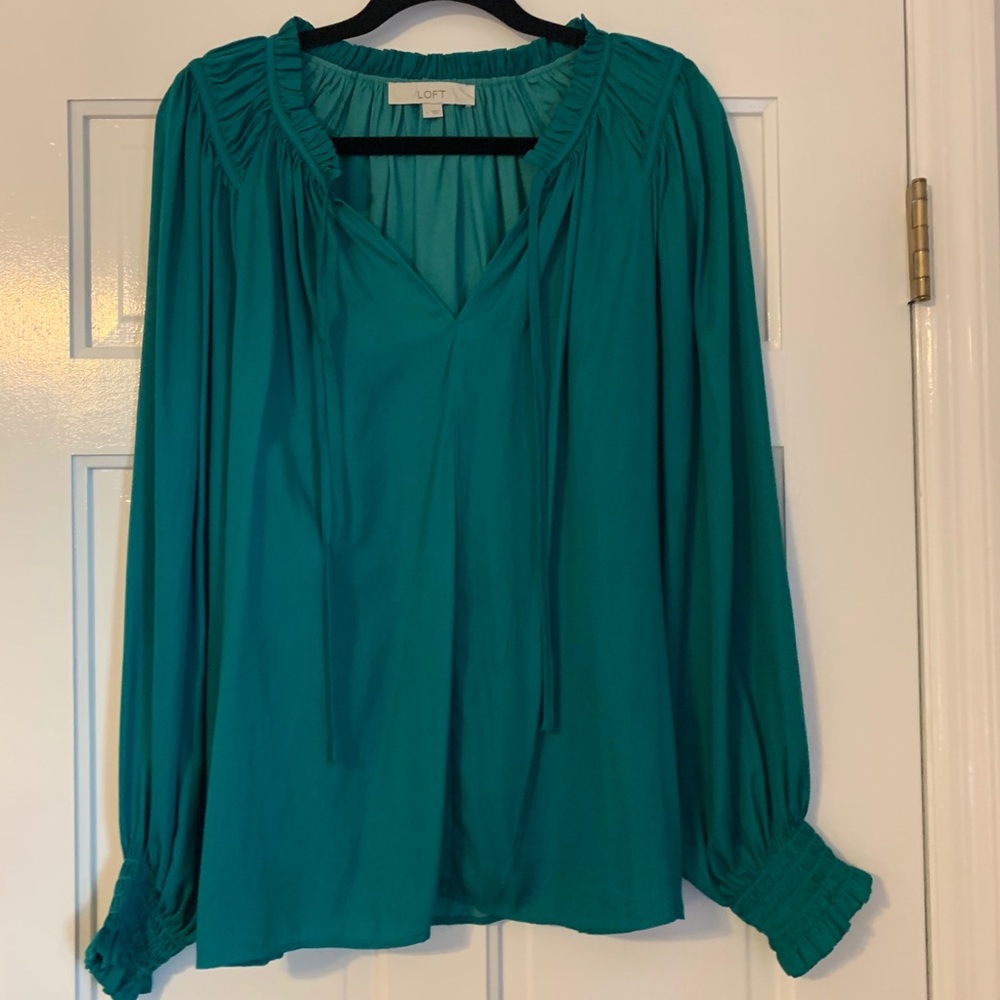 Beautiful emerald green silky blouse